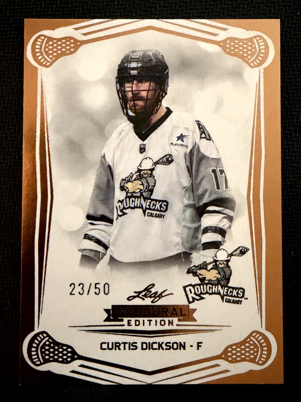 Curtis Dickson 2025 Leaf NLL Inaugural Calgary Roughnecks Rose Gold 23/50 #27