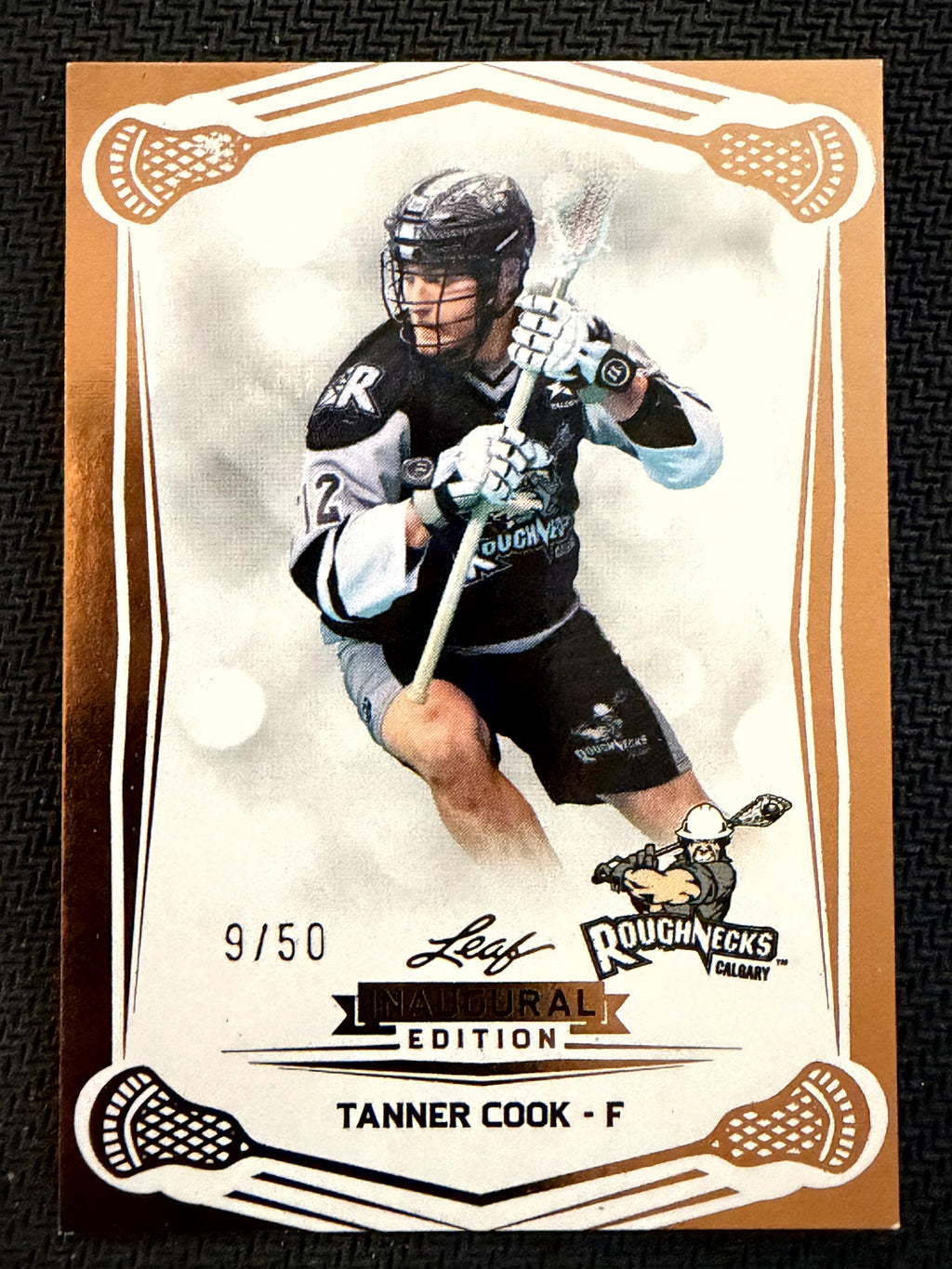 Tanner Cook 2025 Leaf NLL Inaugural Calgary Roughnecks Rose Gold 9/50 #87