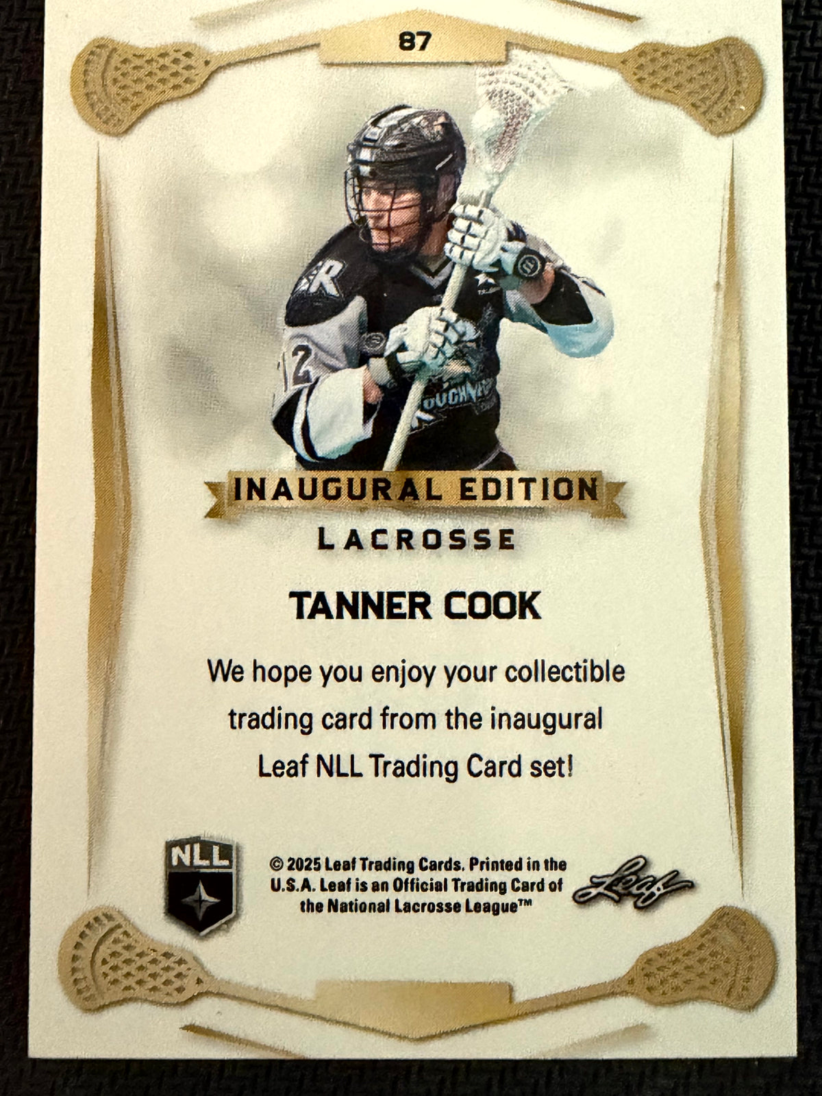 Tanner Cook 2025 Leaf NLL Inaugural Calgary Roughnecks Rose Gold 9/50 #87